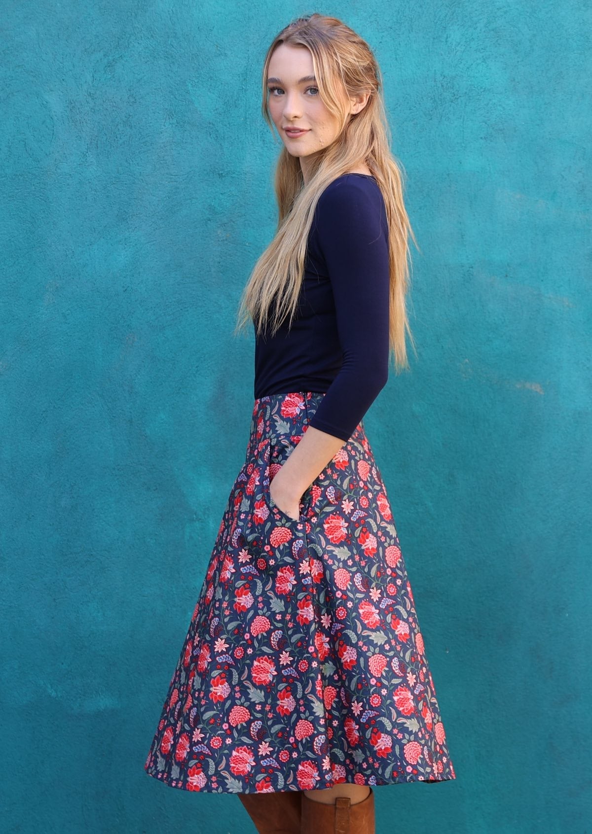 Model in our A-line cotton skirt with pockets and side zipper.