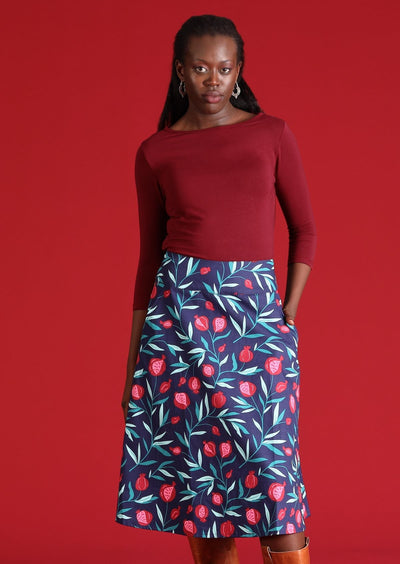 Women wears a 100% cotton skirt with fruit print