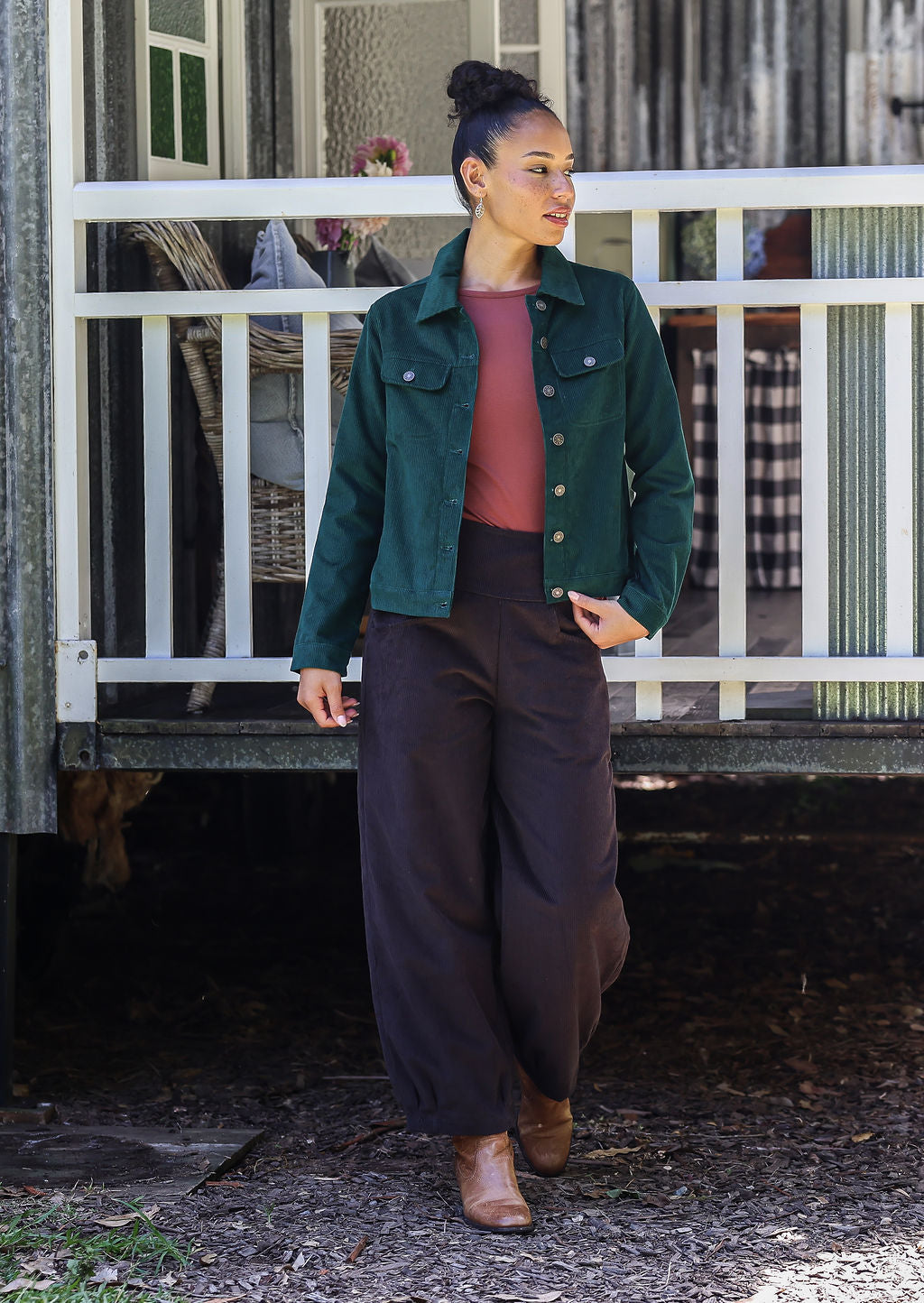 woman wears cotton corduroy jacket over nora corduroy pants ganache 