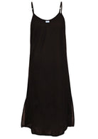 Black cotton voile slip dress with adjustable spaghetti straps, V-neckline, side splits and a picot trim hem, front view