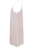 White cotton slip dress with thin adjustable spaghetti straps and a V-neckline, side view