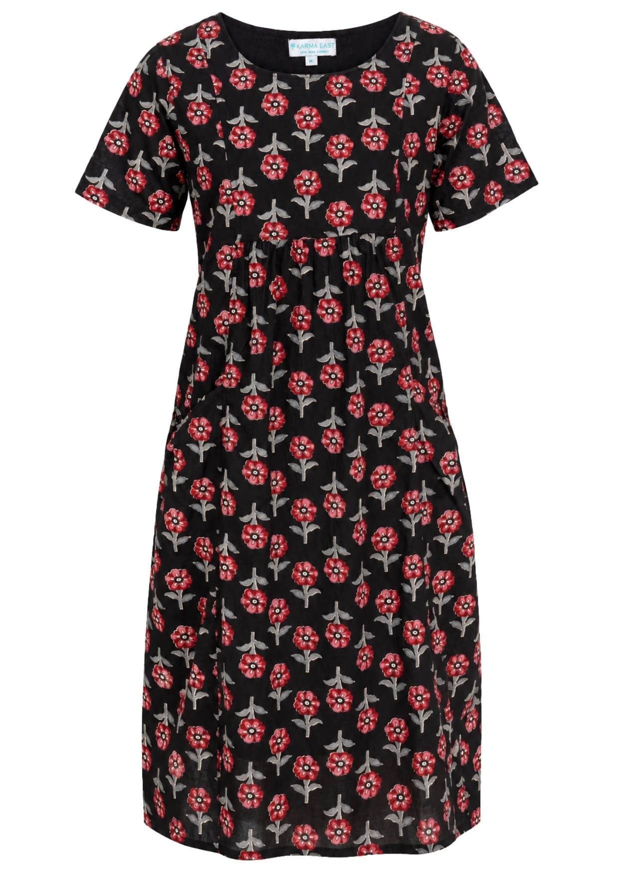 Front view of cotton dress with round neckline in black based floral print