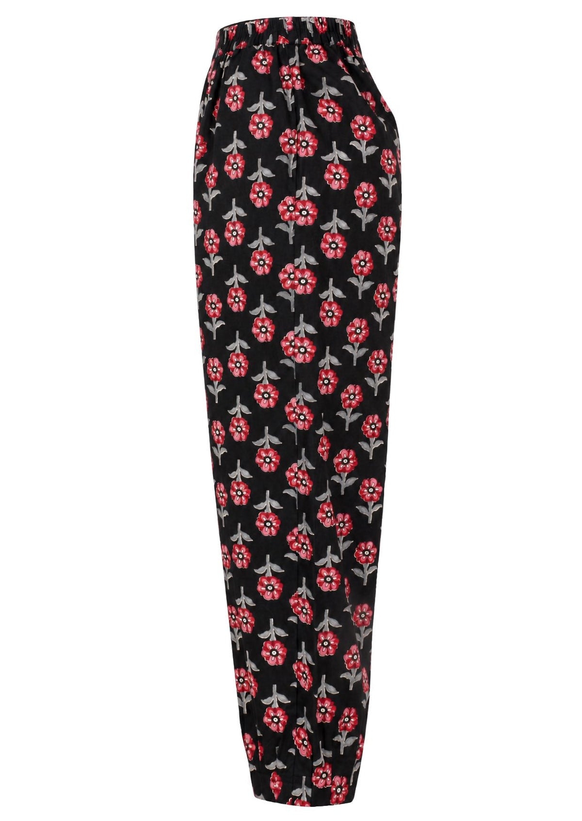 Side view of floral print wide leg cotton pants with pleated ankles, high elastic waist and pockets.