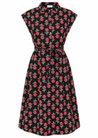 Black based floral print cotton dress with removable waist tie.
