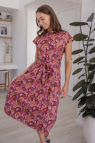 Model in a Japanese style floral print shirt style 100% cotton dress with cap sleeves and detachable waist tie
