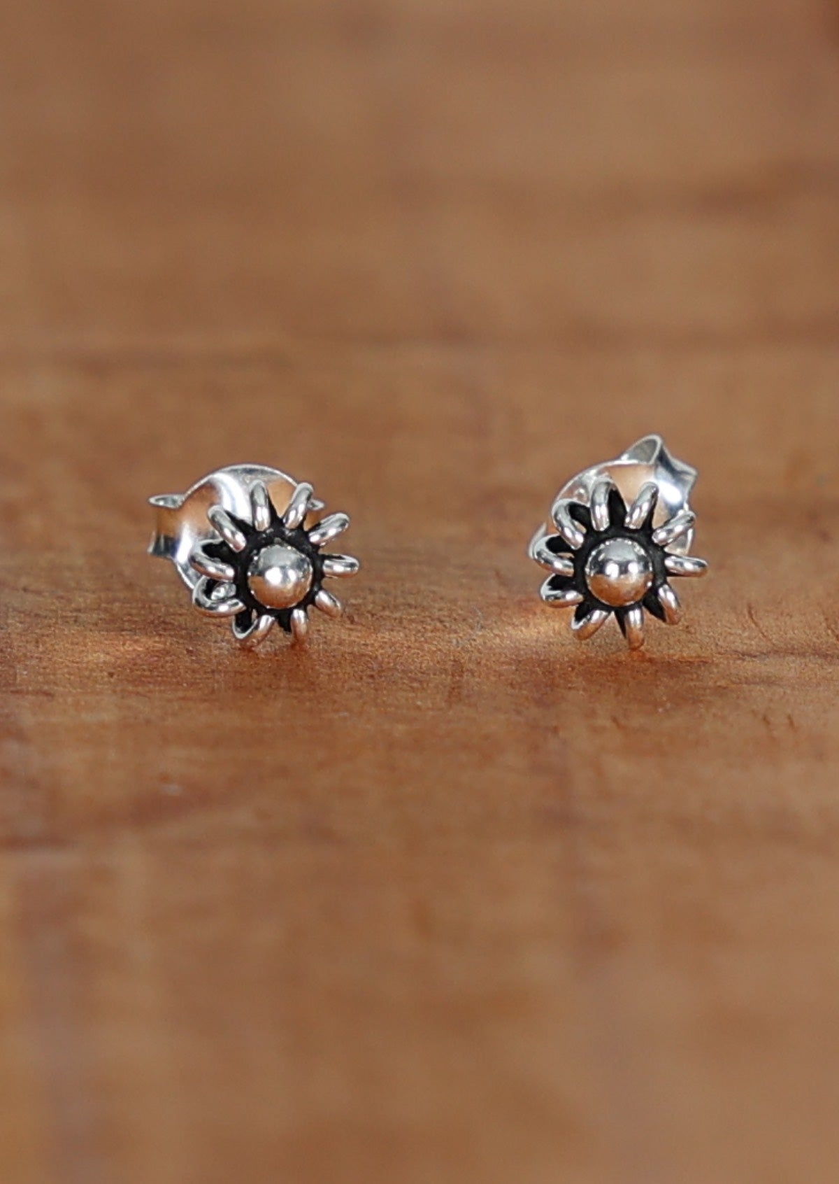 Sterling silver wire spring petal flower stud earrings