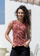Woman wearing a sleeveless 1960's style Japanese style floral print cotton top 