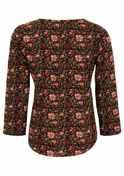 Cotton woman's top with black background and earthy floral motif back view