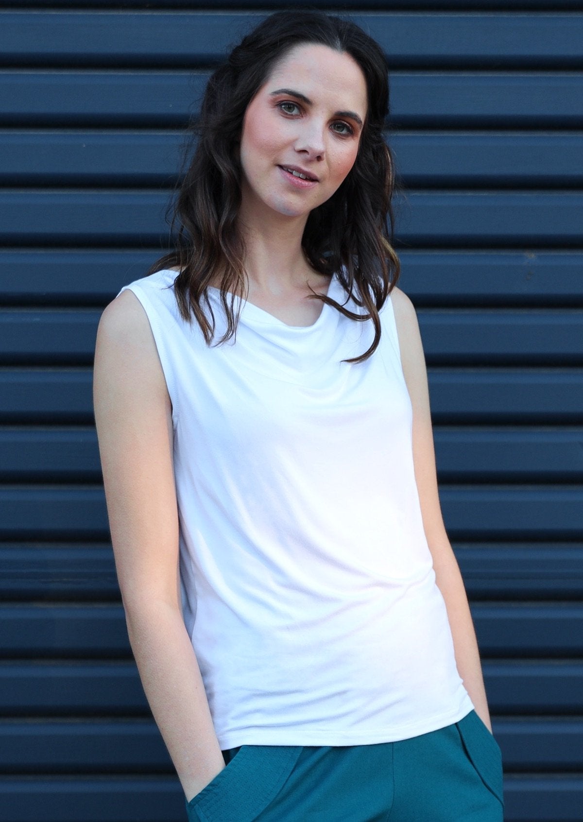 Woman wearing white cowl neck rayon singlet top