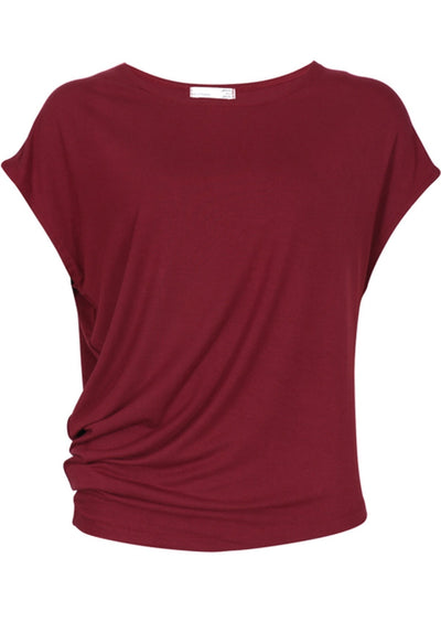 short sleeve women's top with asymmetrical hemline creating gathering at side