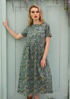 100% cotton Mid Calf Dress with short sleeves and pockets.