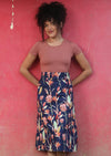 Belt Loop Skirt a-line below the knee length womens skirt with thick waistband and belt loops side zipper 100% cotton navy blue background pink and green toned native floral print | Karma East Australia