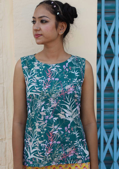 Eden Top sleeveless round neckline a-line fit with slight concave hem 100% cotton teal background with blue grey toned and pink floral print | Karma East Australia