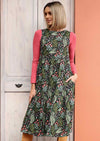 Woman in Harper Dress Cotton Floral Midi Dress sleeveless high neck three tiered cotton midi dress with pockets