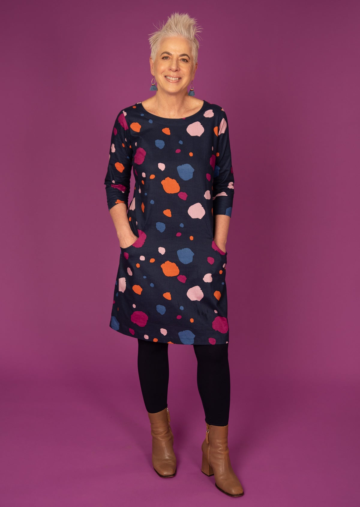 100% cotton knee length dress with 3/4 sleeves, pockets and  round neckline.