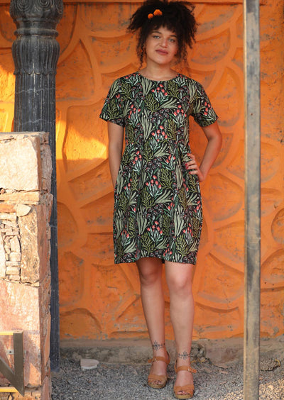Woman in Knee Length Short Sleeve Cotton Dress