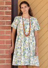 Model in Short sleeve above the knee length 100% cotton\ dress