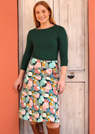 Zarah Skirt wide waistband below the knee length wide a-line cut side pockets side zipper 100% cotton with pastel and teal toned spotted print | Karma East Australia
