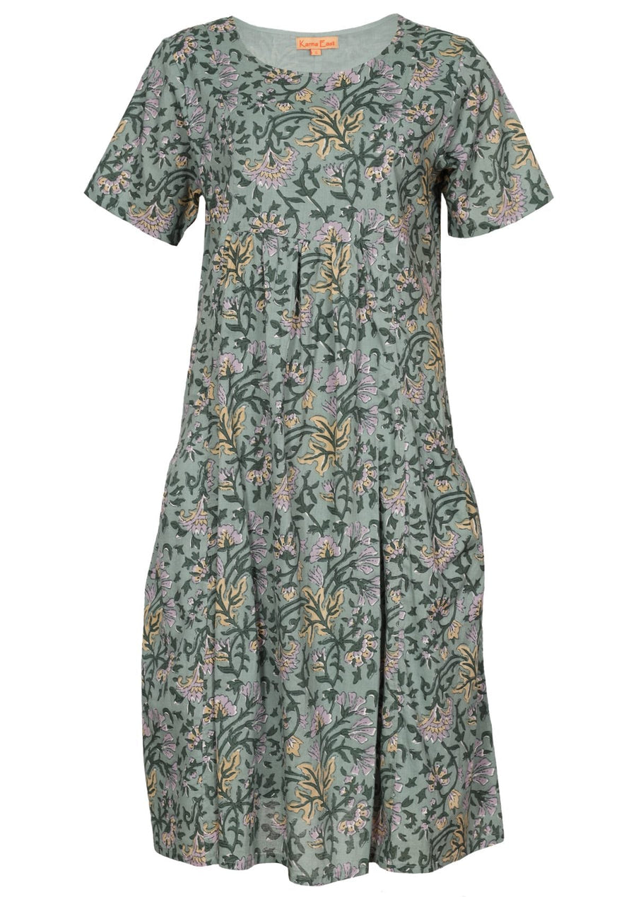 Model wearing Frankie Dress Short Sleeve 100% Cotton Dress round neck short sleeve gathered pleats under bust knee length skirt and pockets