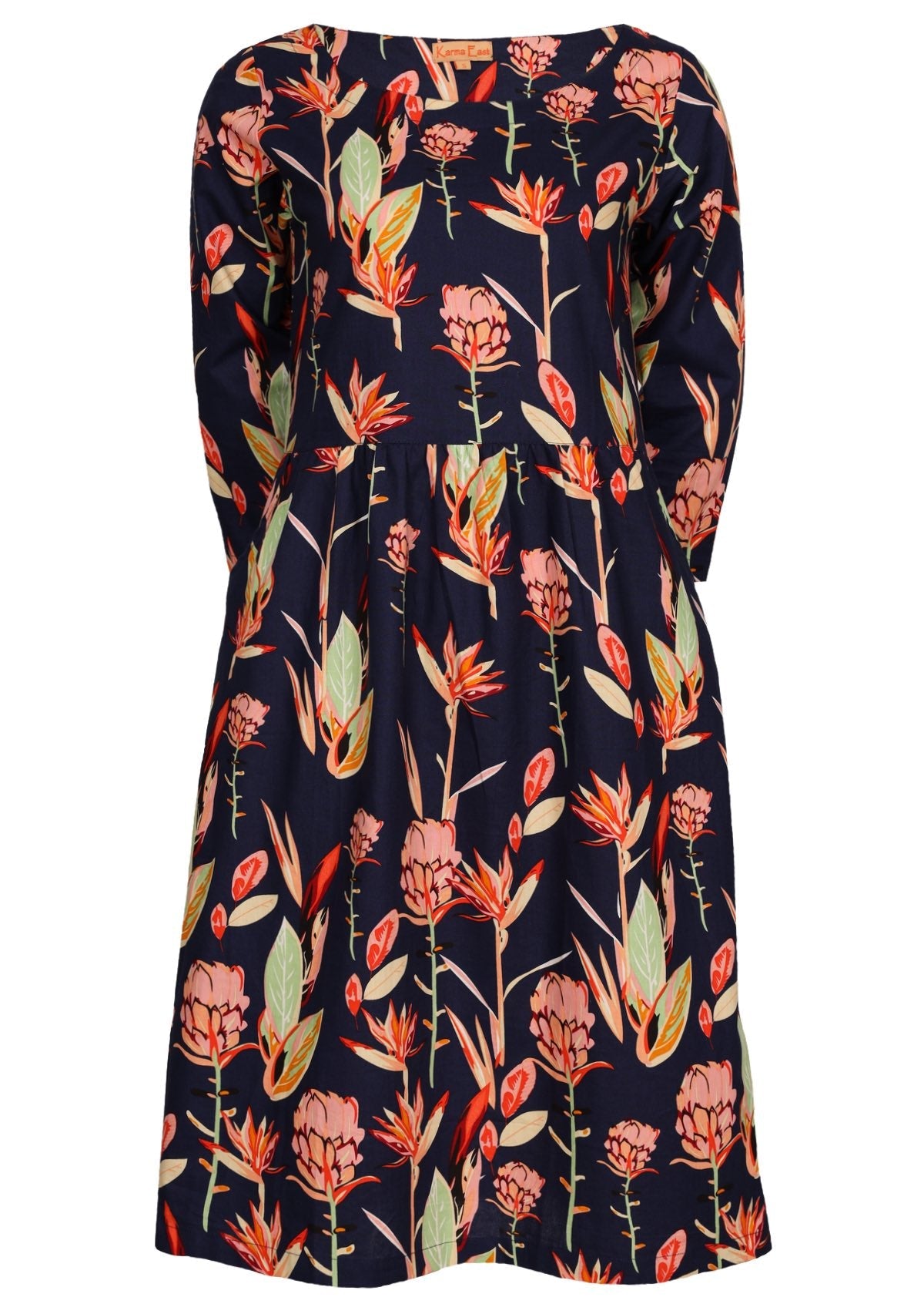 Round neck 3/4 sleeve, knee length dress in pink florals on navy base.